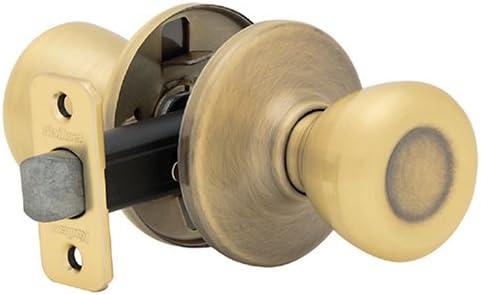 image:imageKwikset Tylo HallCloset Knob in Antique Brass